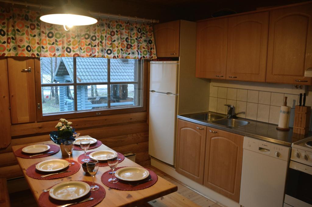Lomapesae Cottages Pertunmaa Szoba fotó