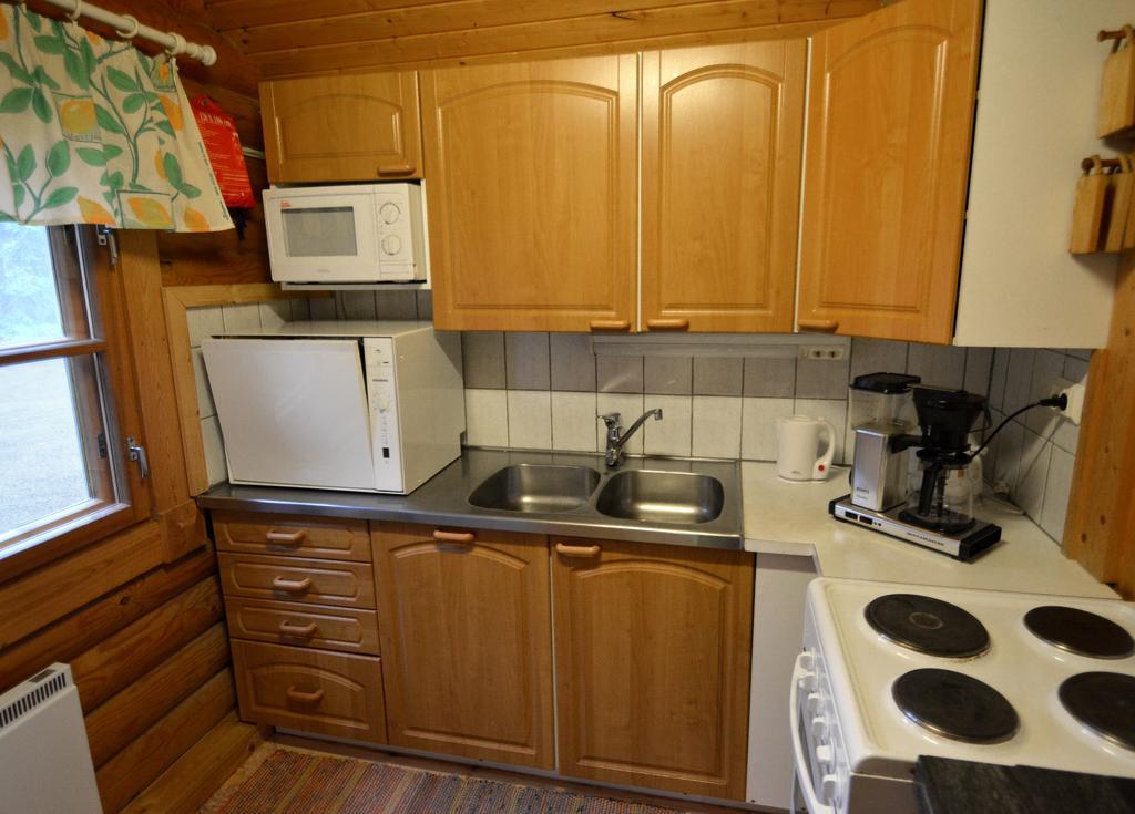 Lomapesae Cottages Pertunmaa Szoba fotó