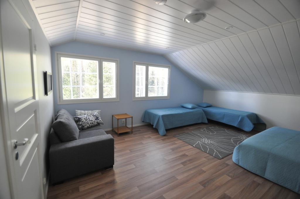 Lomapesae Cottages Pertunmaa Szoba fotó